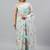 Sea green chiffon printed saree with blouse