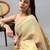 Gold tussar printed saree with blouse
