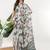 Off white linen printed saree with blouse