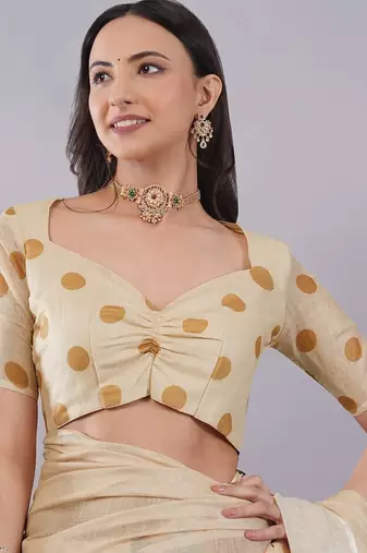 Cream linen printed saree with blouse