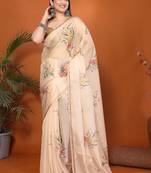 Cream organza printed saree with blouse