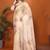 Cream organza printed saree with blouse