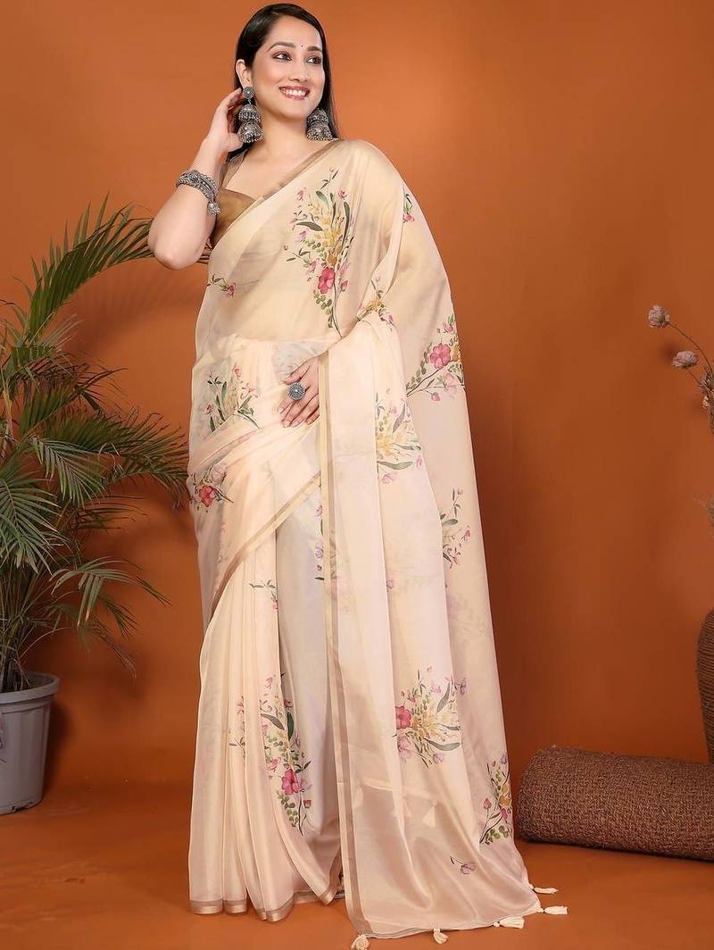 Cream organza printed saree with blouse