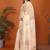 Cream organza printed saree with blouse