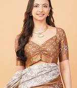 Off white polyester printed saree with blouse