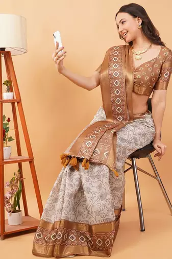 Off white polyester printed saree with blouse