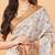 Off white polyester printed saree with blouse