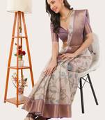 Off white polyester printed saree with blouse