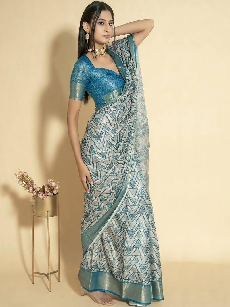 Blue polyester woven design saree with blouse