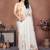 Off white organza printed saree with blouse