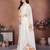 Off white organza printed saree with blouse