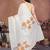 Off white organza printed saree with blouse