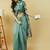 Sea green polyester printed saree with blouse