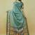 Sea green polyester printed saree with blouse