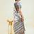 White polyester printed saree with blouse