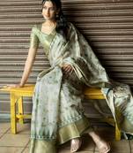 Off white polyester printed saree with blouse