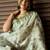 Off white polyester printed saree with blouse
