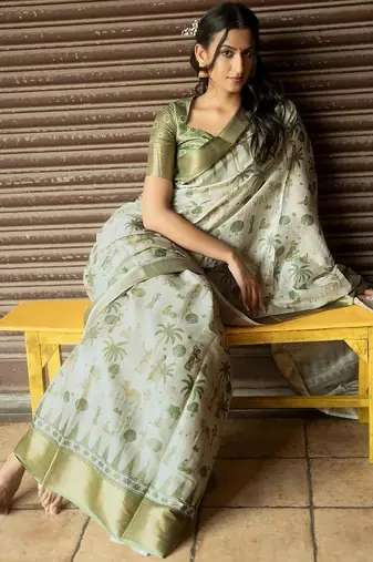 Off white polyester printed saree with blouse