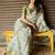 Off white polyester printed saree with blouse