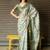 Off white polyester printed saree with blouse