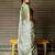 Off white polyester printed saree with blouse