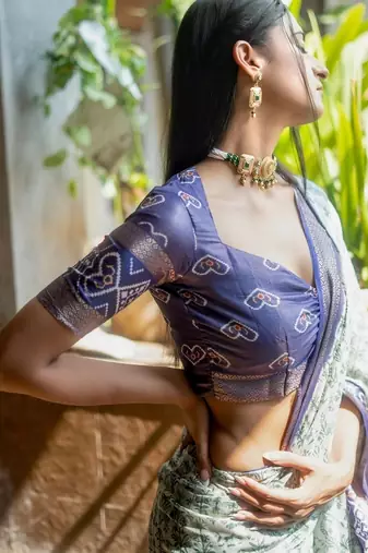 Sea green polyester printed saree with blouse