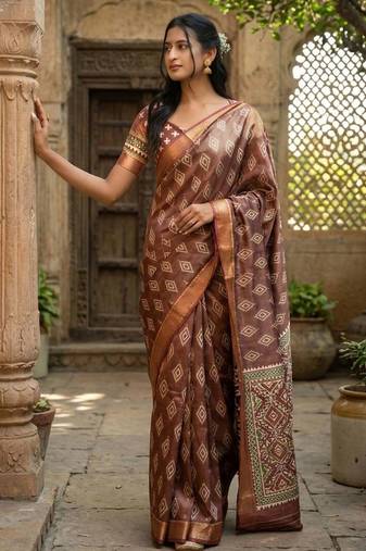 Brown polyester woven design saree with blouse