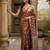 Brown polyester woven design saree with blouse