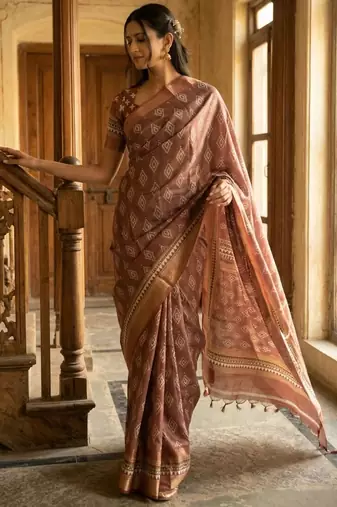 Brown polyester woven design saree with blouse