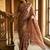 Brown polyester woven design saree with blouse