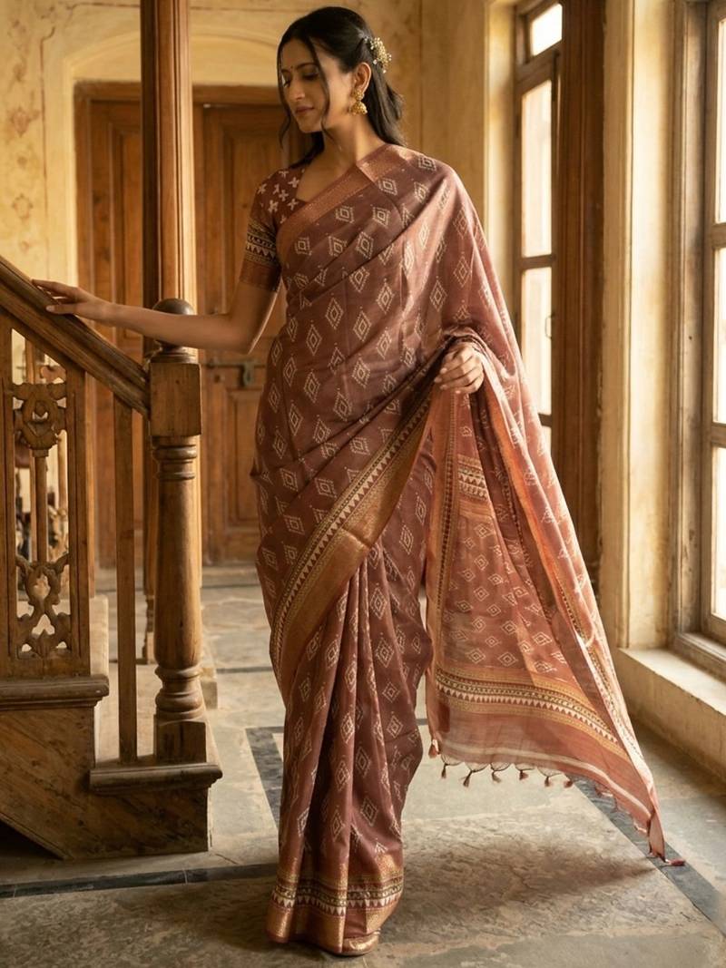 Brown polyester woven design saree with blouse