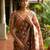 Brown polyester woven design saree with blouse