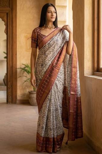 Off white polyester printed saree with blouse