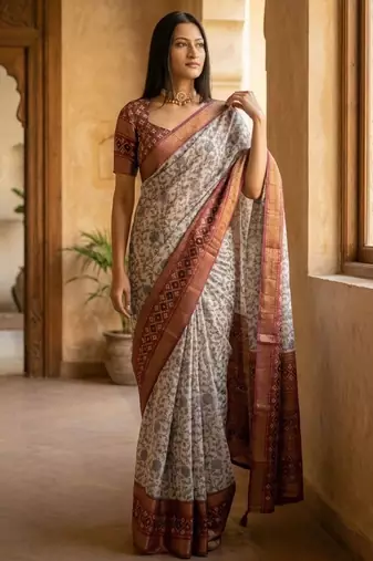 Off white polyester printed saree with blouse