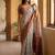 Off white polyester printed saree with blouse