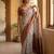 Off white polyester printed saree with blouse