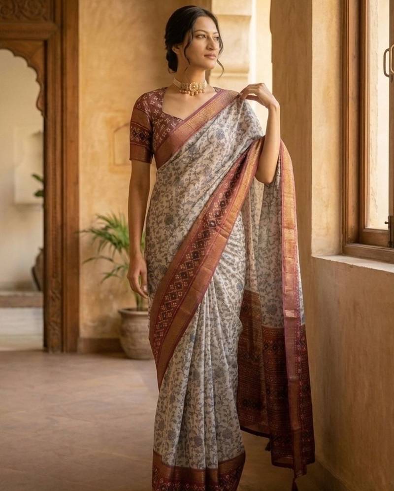 Off white polyester printed saree with blouse
