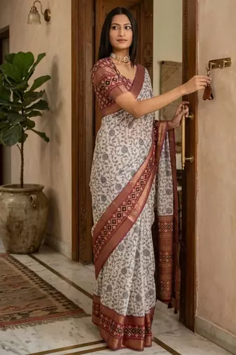 Off white polyester printed saree with blouse