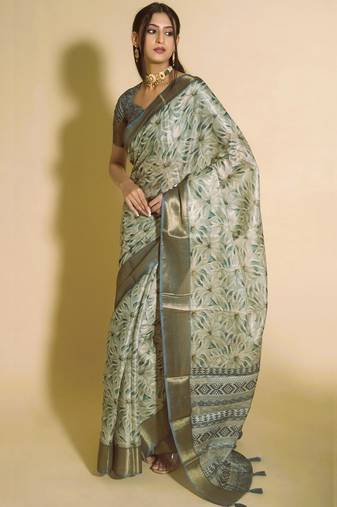 Sea green polyester woven design saree with blouse