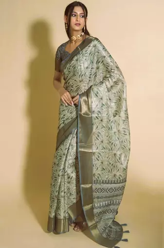 Sea green polyester woven design saree with blouse