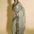 Sea green polyester woven design saree with blouse