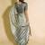 Sea green polyester woven design saree with blouse