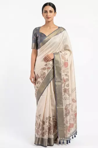 Off white polyester printed saree with blouse