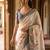 Off white polyester printed saree with blouse