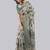 Off white polyester printed saree with blouse