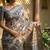 Beige polyester printed saree with blouse