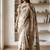 Off white polyester printed saree with blouse