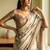 Off white polyester printed saree with blouse