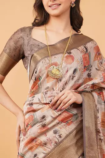 Off white polyester printed saree with blouse