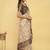 Off white polyester printed saree with blouse